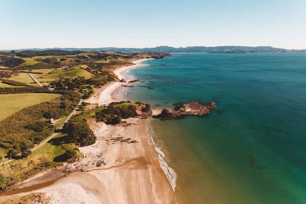 drone photograph over tawharanui regional park