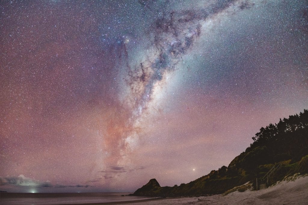 the milky way rising over te arai beach