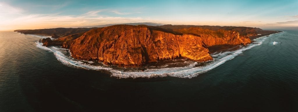 drone panorama across aucklands west coast